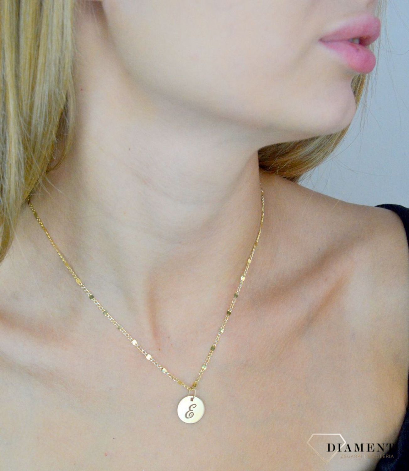 Złota zawieszka 585 literka E ZA 2128E.jpg